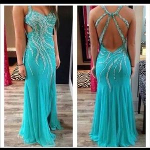 Teal dress with beads worn once. Size 2.